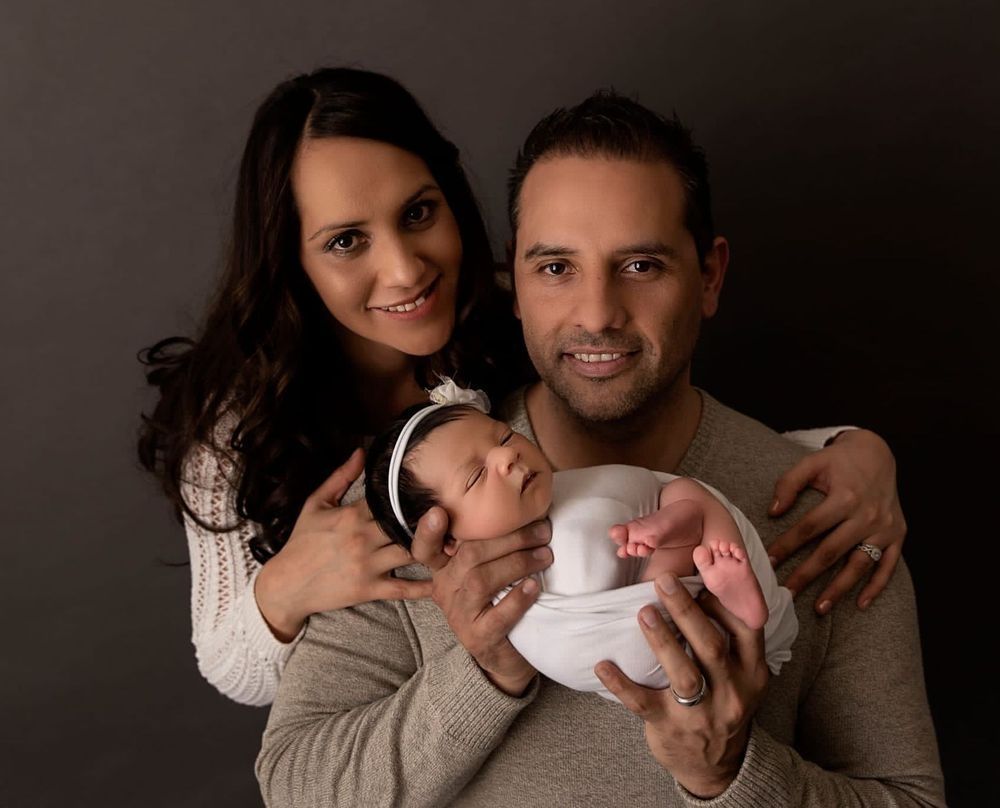 Mrs. Laura with her family